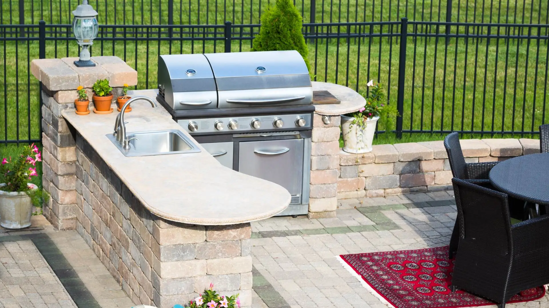 Outdoor kitchen with grill installed in Lansing, MI.